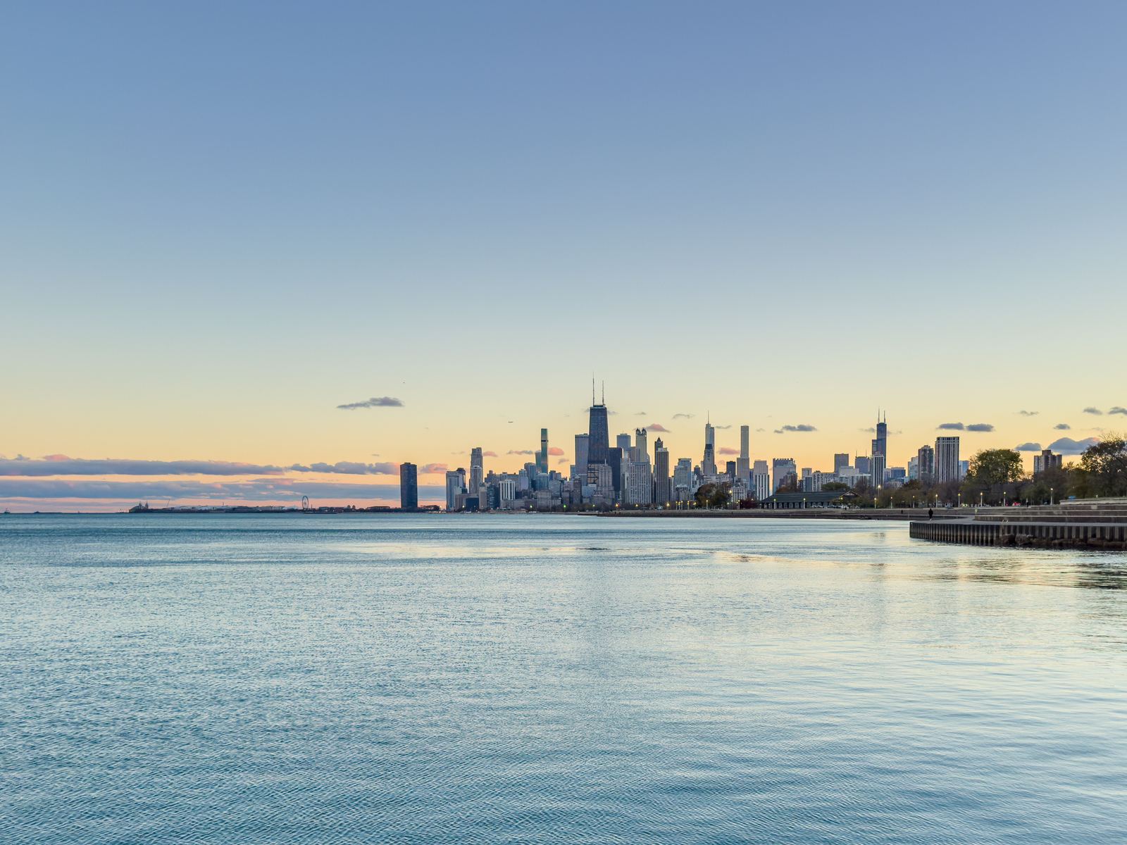 Chicago skyline at sunset over Lake Michigan